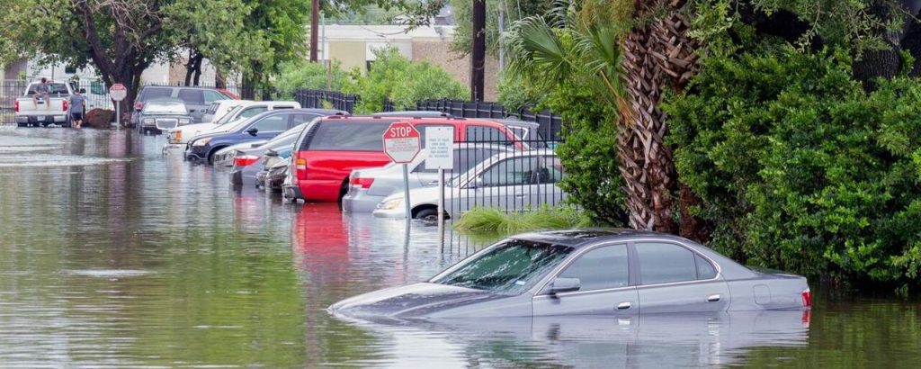 car flooded in a parking lot